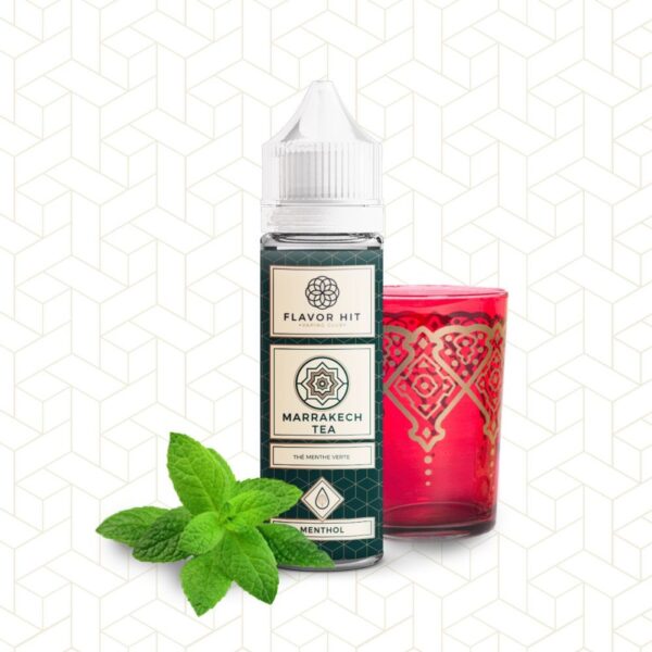 Bouteille de e-liquide Flavor Hit Marrakech Tea avec des feuilles de menthe et un verre de thé décoré en arrière-plan.